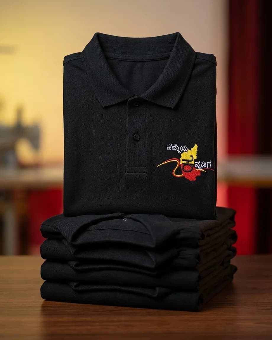 Stack of folded Kannada Rajyotsava polos